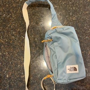 North face cross body backpack